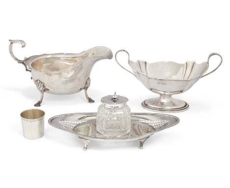 A group of silver items. Various dates and makers. The group comprising: a George V sauce boat, Chester, 1930, Stokes & Irela