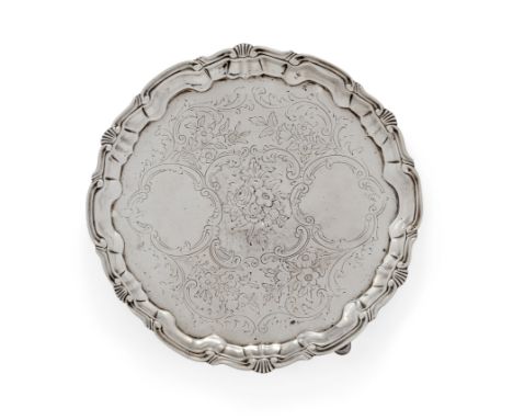 A George II silver salver. George Hindmarsh, London, 1748. The base later flat chased with scrolls, foliage and flowers and r