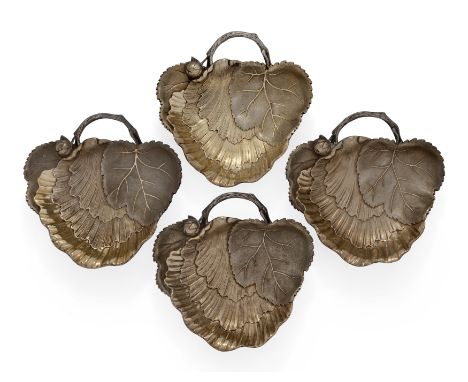 Four 19th century silver gilt fruit dishes. Maison Odiot, Paris, c.1880. Of stylised, foliate form, each shaped dish designed