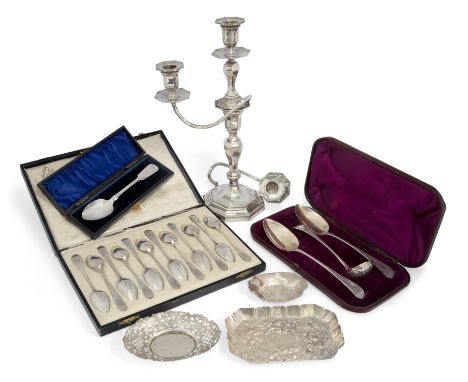A Victorian silver candlestick. Hawksworth, Eyre & Co., Sheffield, 1898. With two wrythen branches (one damaged and detached)