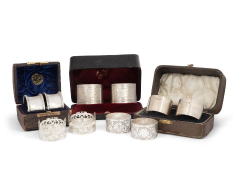 A group of silver napkin rings. Various dates and makers. The group comprising: a cased pair of 19th century French silver na