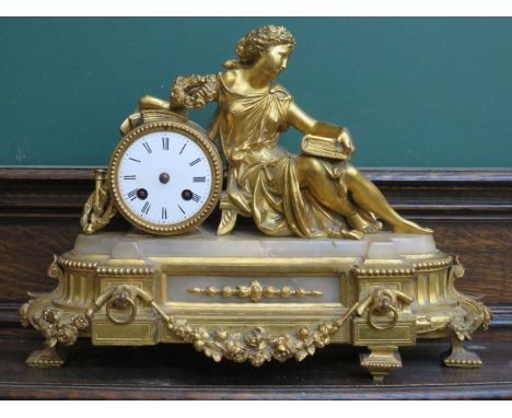 PRETTY GILT METAL FRENCH STYLE MANTEL CLOCK DEPICTING A RECLINING LADY, APPROXIMATELY 32cm HIGH (AT FAULT) 