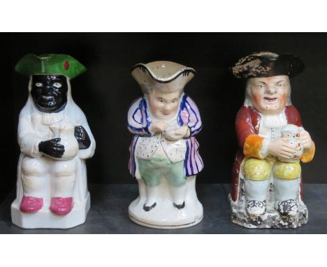 EARLY HANDPAINTED CERAMIC TOBY JUG TO CELEBRATE THE ABOLISHMENT OF SLAVERY (AT FAULT), ALSO TWO OTHER EARLY CERAMIC TOBY JUGS