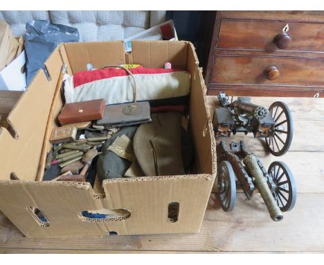 PARCEL OF WORLD WAR II MILITARIA INCLUDING FLAGS, CAPS, TRENCH ART, SWAGGER STICK, ETC, AND ALSO TWO MODEL CANNONS 