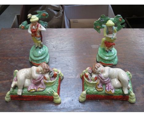 TWO PAIRS OF HANDPAINTED STAFFORDSHIRE FIGURES 