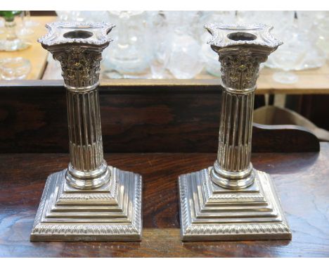 PAIR OF HALLMARKED SILVER COLUMN FORM CANDLESTICKS BY ELKINGTON, SHEFFIELD ASSAY, APPROXIMATELY 17cm HIGH 