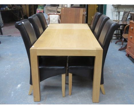 LIGHT OAK EXTENDING DINING TABLE AND SIX CHAIRS 