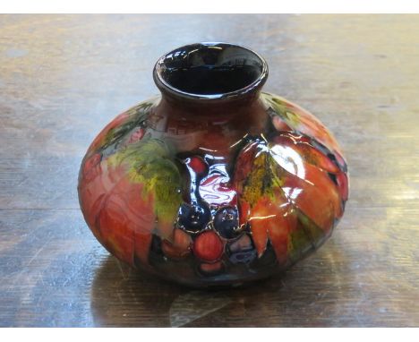 MOORCROFT TUBE LINED SMALL CERAMIC VASE, DECORATED WITH FRUIT AND FOLIAGE, SIGNED AND INITIALLED TO BASE, APPROXIMATELY 9cm H