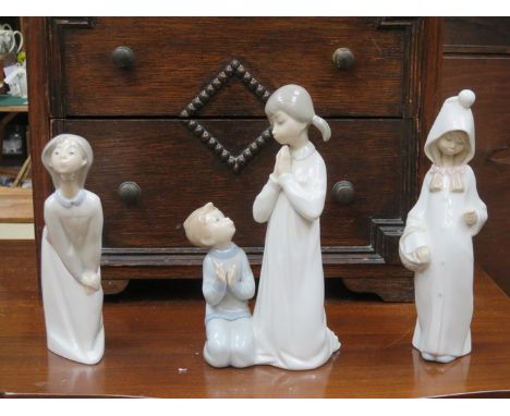 THREE VARIOUS LLADRO GLAZED CERAMIC FIGURES INCLUDING TEACHING TO PRAY 