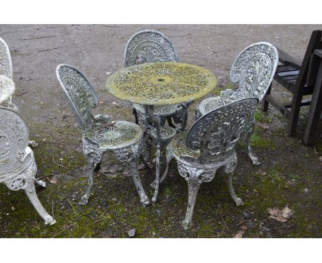 A CIRCULAR SILVER GROUND ALUMINIUM GARDEN TABLE, diameter 69cm x height 69cm and four matching chairs (5)