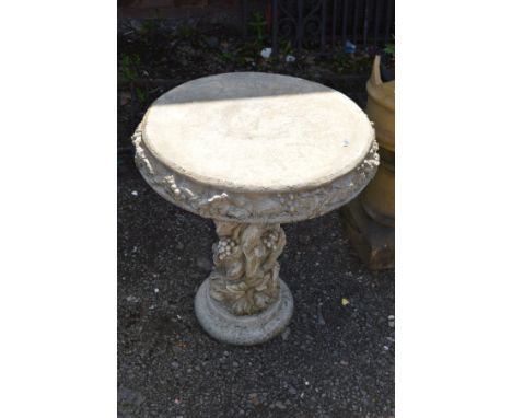 A MODERN COMPOSITE CIRCULAR GARDEN TABLE, on a tree stump style base, diameter 60cm x height 73cm