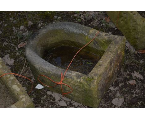 A SANDSTONE PUMP TROUGH, width 42cm x depth 56cm x height 26cm