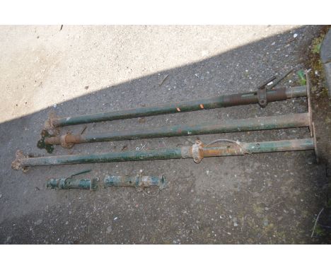 A SET OF THREE GREEN PAINTED ACROW PROPS, and two smaller acrow props (5)