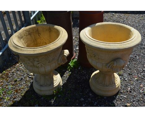 A PAIR OF CLAY CAMPAGNE GARDEN URNS, with twin scrolled handles on a separate base, diameter 56cm x height 68cm (2)