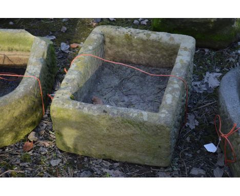 A RECTANGULAR SANDSTONE TROUGH, width 55cm x depth 45cm x height 26cm