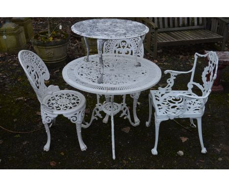 A CIRCULAR WHITE GROUND ALUMINIUM GARDEN TABLE, diameter 81cm x height 67cm, two matching chairs, together with a similar arm