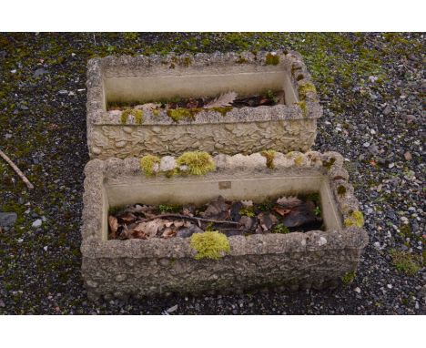 A PAIR OF RECTANGULAR COMPOSITE GARDEN PLANTERS, with foliate decoration, width 72cm