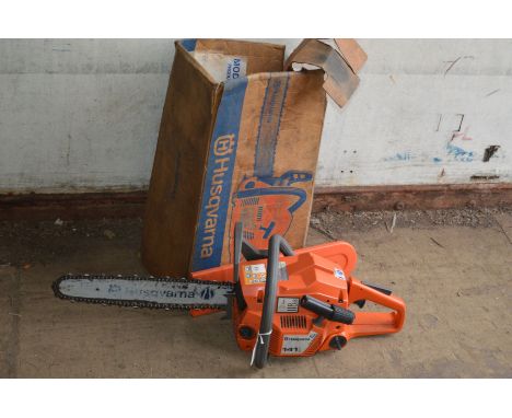 A HUSQVARNA 141 PETROL CHAINSAW, (original box)