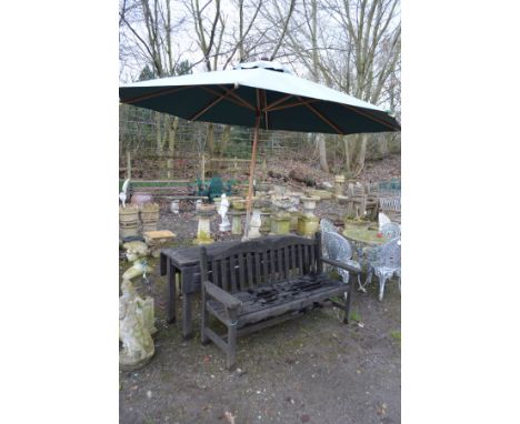 A TEAK RECTANGULAR DROP LEAF GARDEN TABLE, width 168cm x open depth 96cm x closed depth 48cm x height 76cm, parasol and cast 