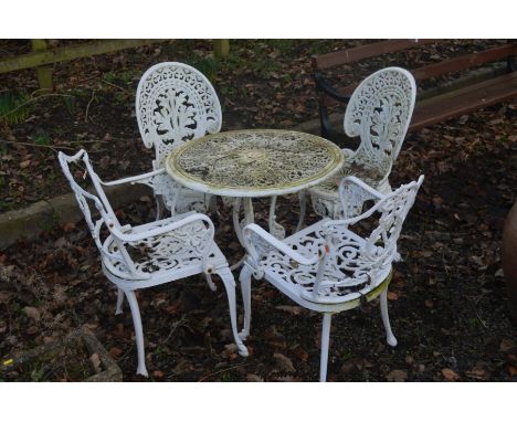 A WHITE PAINTED ALUMINIUM CIRCULAR GARDEN TABLE, diameter 69cm, together with a pair of matching chairs and a similar pair of