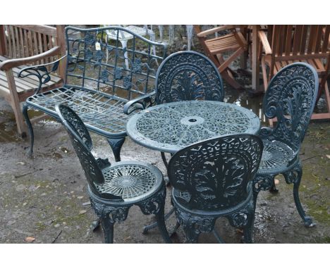 A CIRCULAR GREEN GROUND ALUMINIUM GARDEN TABLE, diameter 68cm and four matching chairs, together with an aluminium two seater