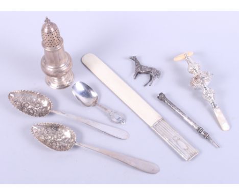 A Georgian design silver rattle with mother-of-pearl handle and ivory teething ring, a silver handled ivory letter opener, a 