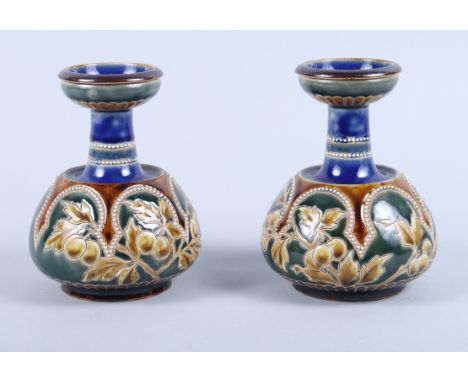 A pair of Doulton Lambeth baluster vases with leaf and berry decoration, 5 1/2" highCondition: No visible chips, cracks or re