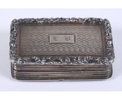 A silver vinaigrette, by Nathaniel Mills, with engine turned decoration and cast border, gilt interior with pierced grilleCon