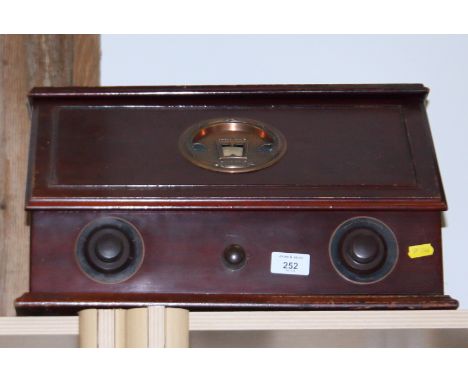 A Marconiphone Type 32 cased radio together with a speaker
