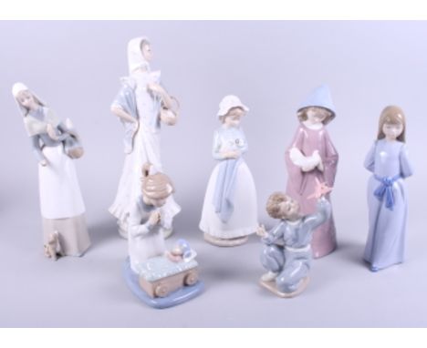 A Lladro figure, woman carrying a basket, 13 " high, a similar Nao figure, and five Nao figures of children in various poses 