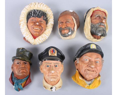 A group of six Bossons Congleton painted plaster busts, and a wooden cased steel pocket corkscrew advertising L M S hotels 