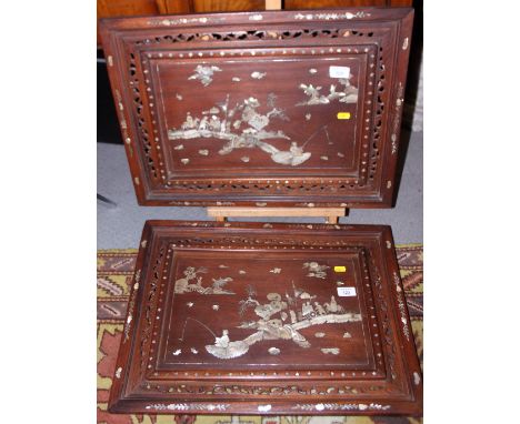 A pair of early 20th century Chinese hardwood trays with applied mother-of-pearl decoration of landscape scenes and one other