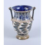 A Doulton Lambeth two-handled urn-shaped vase, 5" high