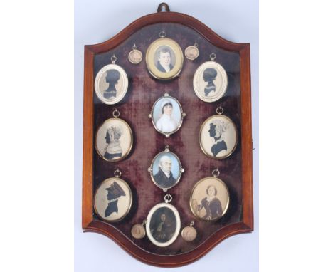 Fourteen portrait miniatures of the Birkett family dating from the early 18th century, in an inlaid mahogany glazed case 