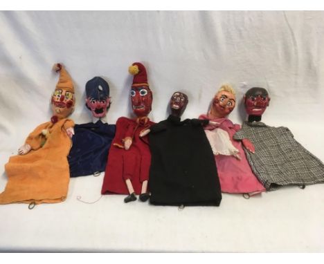 RED PLASTIC TRUNK WITH PUNCH &amp; JUDY HAND PUPPETS 