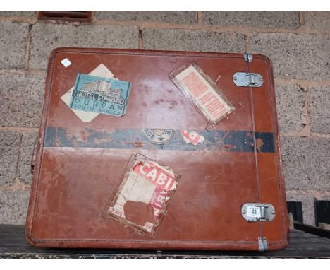 BROWN HARD LEATHER VINTAGE SUITCASE BY REVELATION LUGGAGE WITH VARIOUS SHIPPING LABELS
