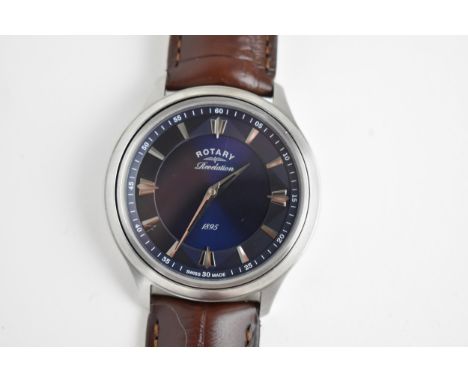 A gents Rotary Revelation dual face quartz wristwatch, having a white enamel dial with Roman numerals, second blue dial havin