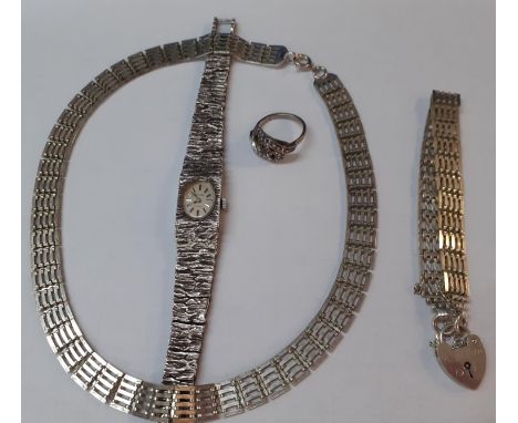 Silver jewellery to include ladies Accurist watch, a ring, a gate bracelet and necklace, 81g totalLocation: 