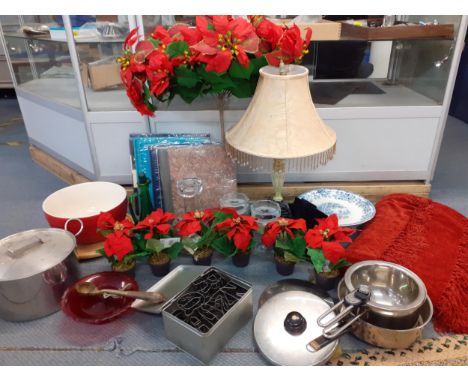 A mixed lot to include a red chenille throw, faux poinsettias, kitchenware to include pans, and a mixing bowl, a lamp, a suit