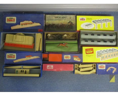 A boxed Escalado horse racing games, and various Hornby Dublo boxed railway accessories to include an Engine Shed extension k
