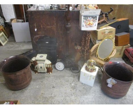 A mixed lot to include two patinated metal jardinieres, a boxed snow globe, wicker child's chair, wall mirror, Dunlop travell