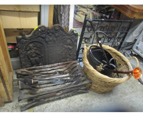 Fire related items to include a grate, fire irons, a long basket, a cast iron fire back and other itemsLocation: G 