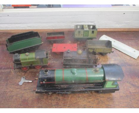 A Hornby clockwork LNER 460 tin plate model engine, a LNER 623 clockwork engine, a Meccano tender, vintage model steam engine