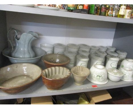A quantity of kitchen ceramics to include a Copeland Spode wash jug and bowl, Grimwades storage jars and covers and jelly mou