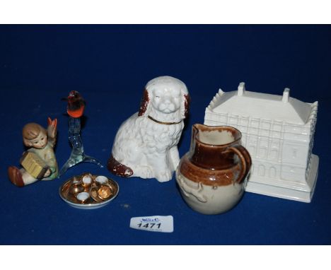 A Cauldon China replica of the Queen's Dolls House designed by Sir Edwin Lutyens, 4 1/2'' long x 4'' high, a Goebel figure, s