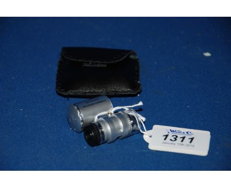 A Collector's Cased LED Illuminated 60X  Magnification Lens  & UV Lamp.