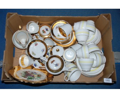 A yellow and gilt banded ''Windsor'' part Teaset comprising nine Cups and saucers, twelve Tea Plates, plus a quantity of gilt