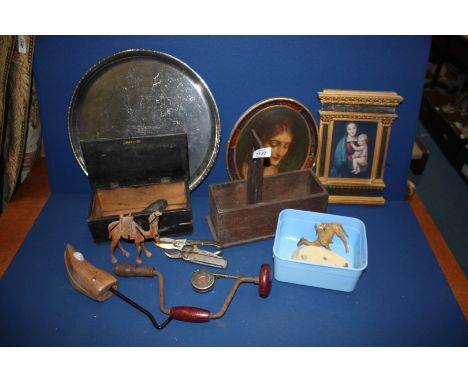 A tray of miscellanea including wooden box containing tools and a tape measure, a camel, an old hand drill, wooden picture fr