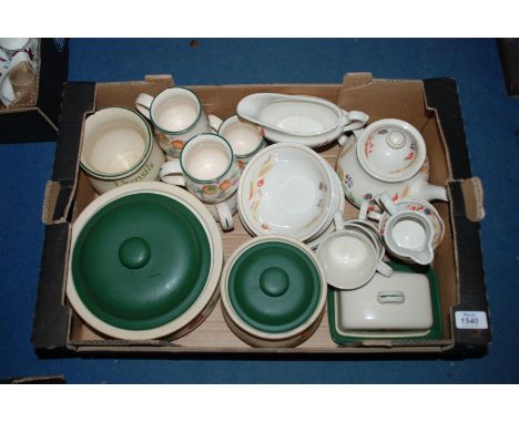 A quantity of china including Clover Leaf Biscuit Barrel, Mugs, Utensil Holder, Butter Dish in peach and cream design along w