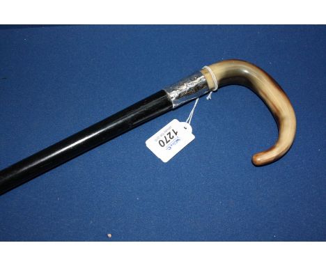 A horn handle ebonised walking Stick with wide silver band